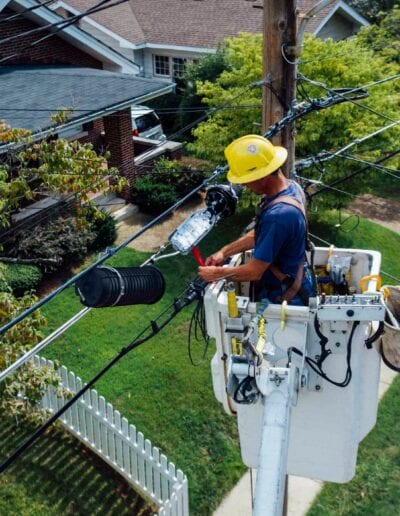 Utility worker in bucket